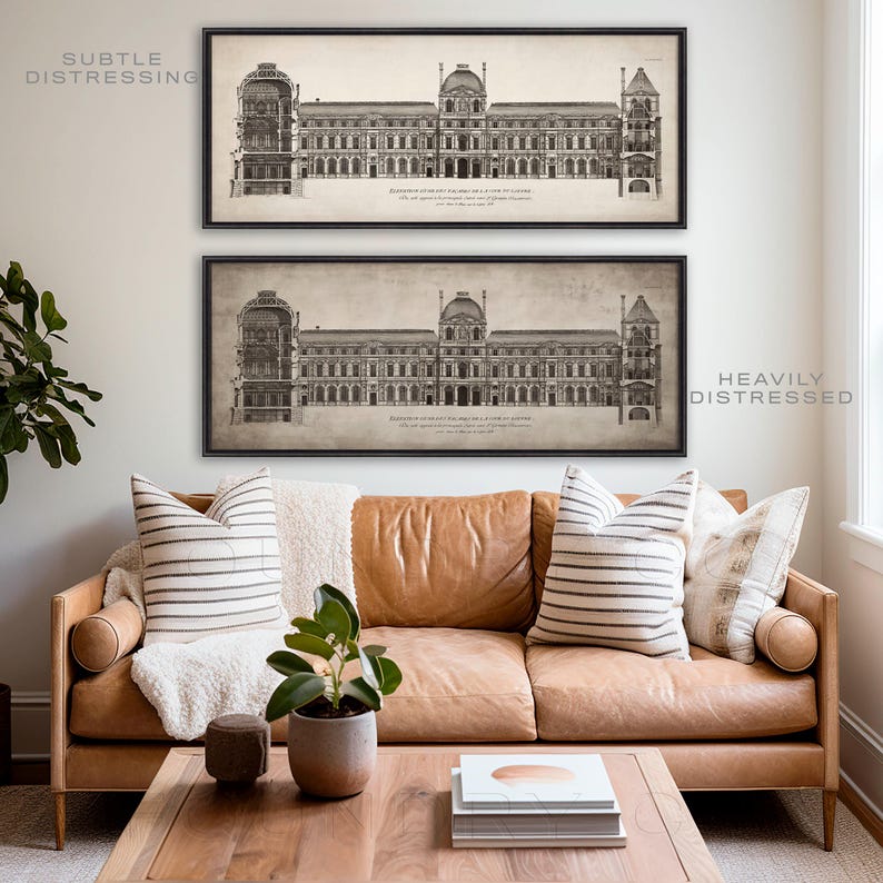 May include: Two black framed prints of architectural drawings of a building. The top print has the text "SUBTLE DISTRESSING" in the top left corner. The bottom print has the text "HEAVILY DISTRESSED" in the bottom right corner. The prints are hanging on a white wall above a brown leather sofa with striped pillows.