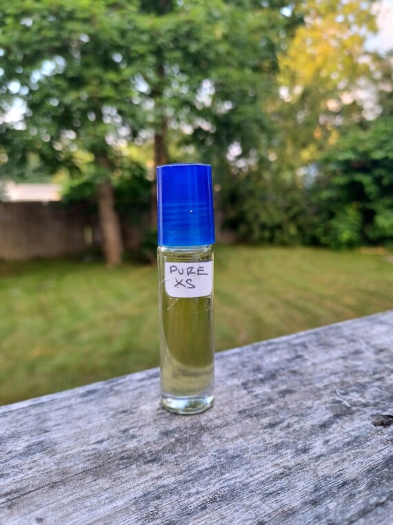 Pure XS Fragrance Body Oil 1 3oz Roll On