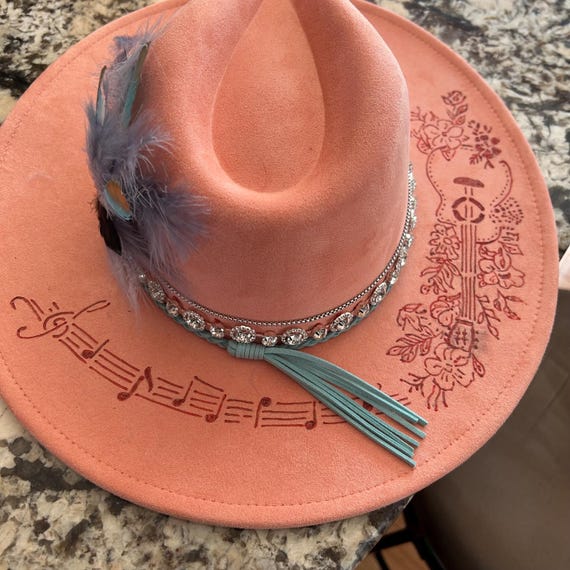Custom Burnt Guitar and Notes Peach Fedora with Feather Accent, with Bling. Customized fedora hat with guitar pick and feather accent main image 2