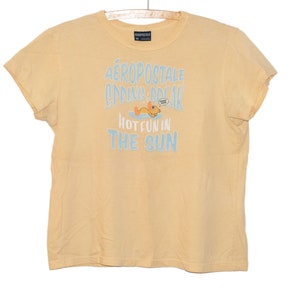 Vintage Aeropostale Spring Break Hot Fun In The Sun Duck Light Pale Yellow Baby Doll T-Shirt Small/Medium Ladies Late 90&#39;s Early 2000&#39;s 00&#39;s
