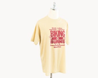 Vintage Great Lakes Biking for Burns 1987 Bikeathon Brown Tan T-Shirt Medium/Large Jerzees Made in U.S.A. Health Fitness Weight Loss