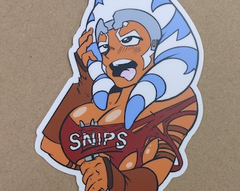 May include: A sticker featuring a cartoon illustration of a female character with blue and white headbands, wearing a red shirt with the word "SNIPS" printed on it, holding a lightsaber. The character has a flushed face and is sticking out her tongue.