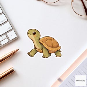 May include: A die-cut sticker featuring a cartoon turtle with a light green body, a tan shell with dark brown outlines, and large black eyes. The turtle is depicted in a side profile view, walking toward the left, with a small pink blush on its cheek.