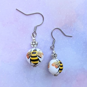 Porcelain flower bee bead silver earrings.