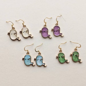 Spooky cute resin ghoul ghost earrings.