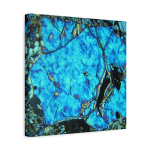 May include: A canvas print featuring a close-up view of a mineral sample. The image showcases a vibrant blue crystalline structure with intricate cracks and colorful inclusions. The artwork is mounted on a white background.
