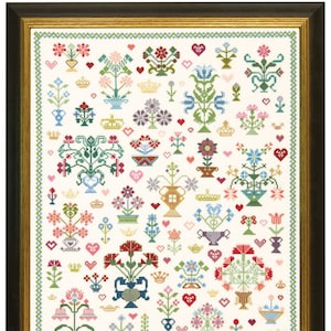 Könnte beinhalten: Ein weißer Hintergrund mit einem sich wiederholenden Muster aus bunten Blumenmustern in verschiedenen Stilen und Farben. Die Muster umfassen Blumen, Blätter und Vasen. Das Muster ist in einem goldenen Rahmen gerahmt.