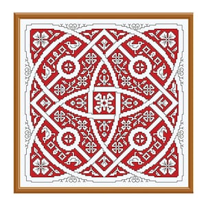 May include: A framed red and white cross-stitch pattern with a geometric design. The pattern features a central square with a four-pointed star and a series of interlocking circles and squares.