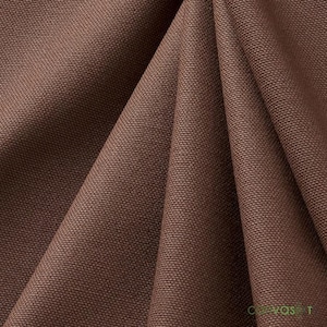 May include: Close-up of a brown fabric with a textured weave. The fabric has a subtle sheen and a smooth, soft feel.