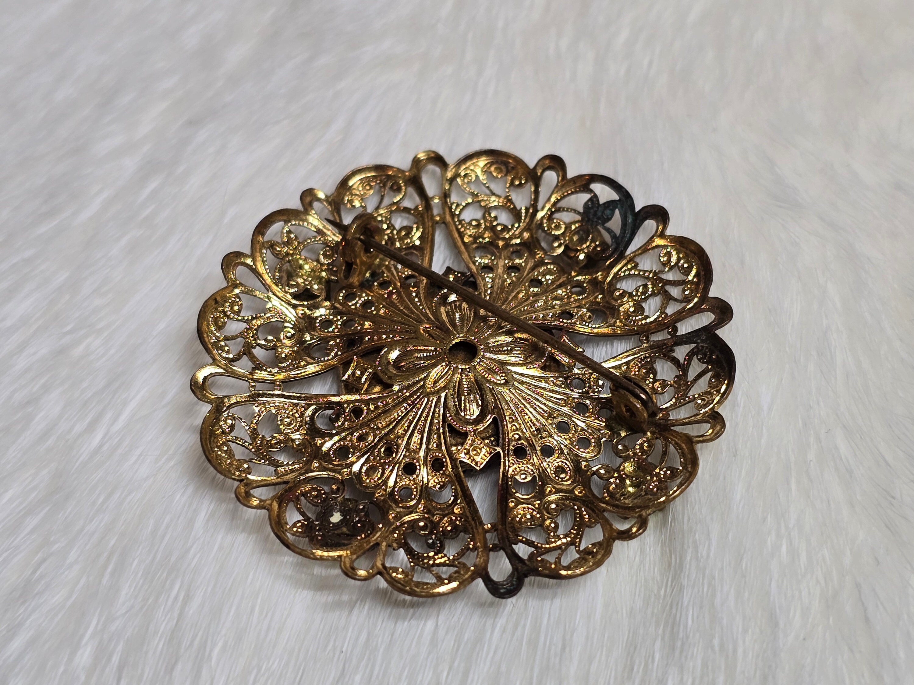 Vintage Filigree Brooch With AB Rhinestones and Blue Prong