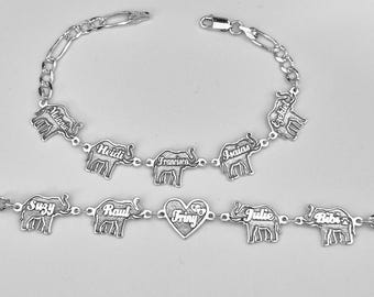 Pulsera personalizada de plata de ley con forma de elefante, cadena Figaro y nombres grabados en relieve.