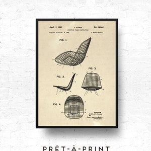 May include: Framed print of a vintage furniture patent, featuring detailed diagrams of a chair design. The print includes technical drawings, dates, and the name of the inventor. The print is in black and white, with the text "PRET-A-PRINT" at the bottom.
