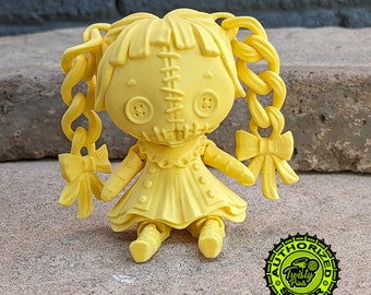 articulated creepy doll figurine, ready to ship in yellow matte filament!