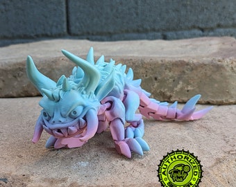 articulated hodag figurine, ready for immediate shipment in pastel Vertical Rainbow filament, creepy cute cryptid