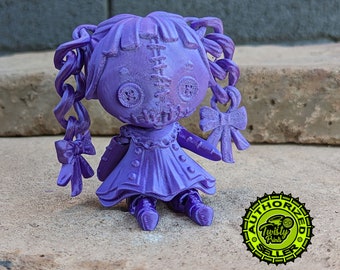 articulated creepy doll figurine, ready to ship in purple silk filament!