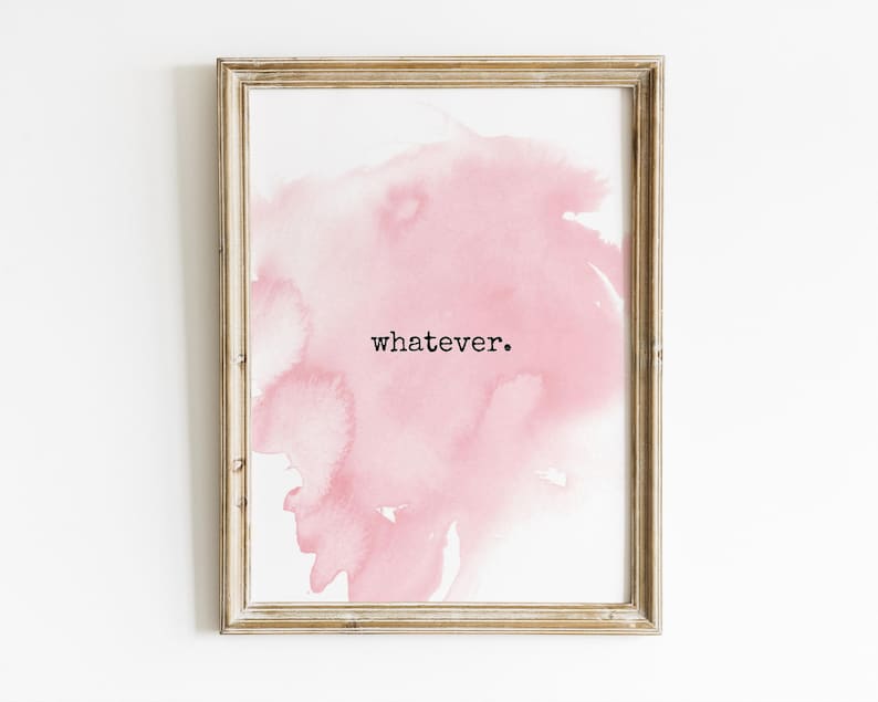 May include: Framed art print featuring a soft pink watercolor wash design. The artwork includes the word "whatever" in a black, minimalist font. The frame is a light, natural wood color, adding a touch of rustic charm to the piece.