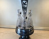 Antique Silver Plate and Etched Crystal Six Cruet Bottles in a Rotating Silver Plate Condiment Caddy