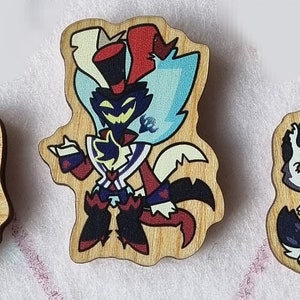 May include: Set of 8 wooden pins featuring cartoon characters with red, black, white and blue details. The characters are wearing various outfits and accessories.