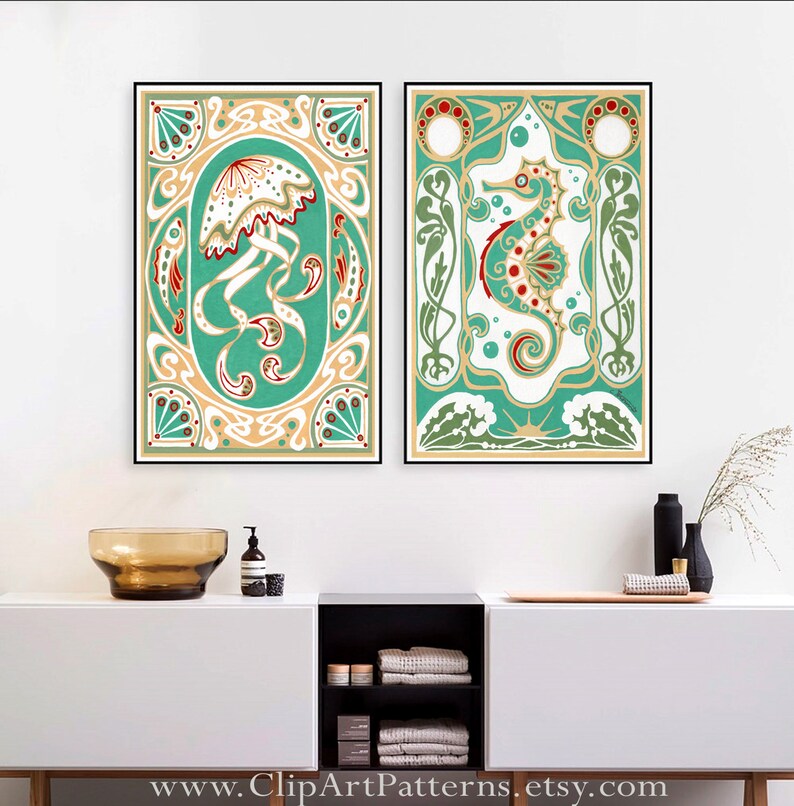 May include: Two framed art prints with a green background and intricate gold and white designs. The left print features a jellyfish with a white bell and red and gold tentacles. The right print features a seahorse with a red and gold body and a white tail.