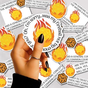 May include: A hand holding a sticker with a yellow d20 die in flames. Other stickers show similar designs and text such as "I used to trust people, then I met a wizard who cast fireball."