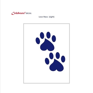 May include: Two blue paw prints with a heart in the center of each print. The text "Love Paws (right)" is above the prints.