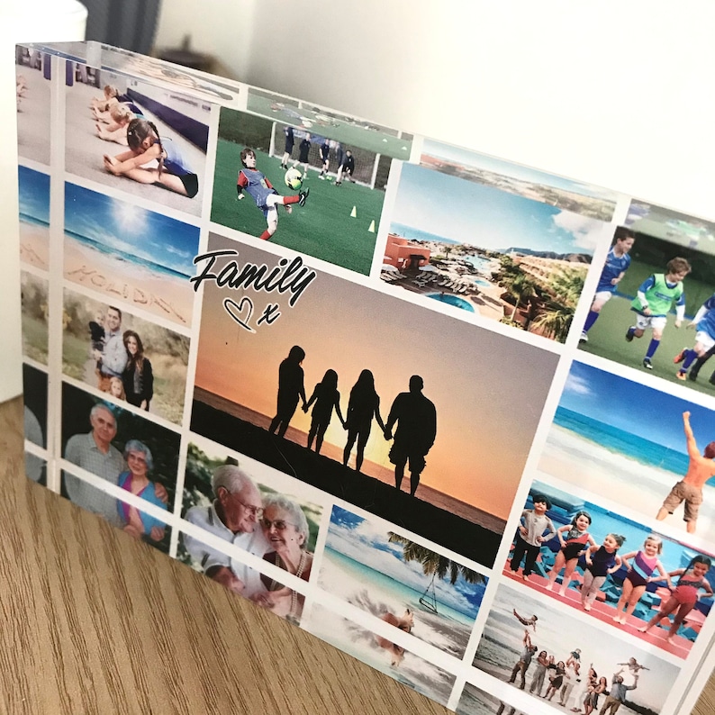 May include: A collage of family photos printed on a clear acrylic block. The photos show a family on vacation, playing sports, and spending time together. The text "Family" is written on the block with a heart and an "x".