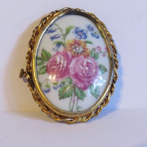 Gorgeous vintage French Limoges porcelain brooch depicting hand painted roses and forget-me-nots