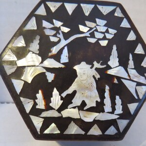 A treasured find black lacquer vintage box with exquisite mother of pearl inlay