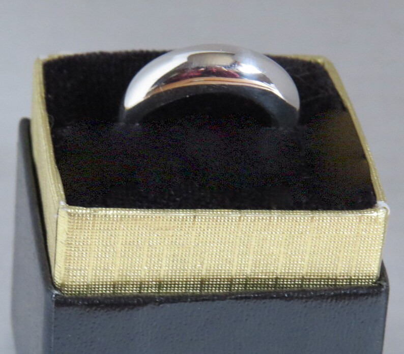 Exceptionally fine domed simplistic sterling silver band