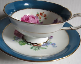 Outstanding floral double warrant Paragon cup and saucer