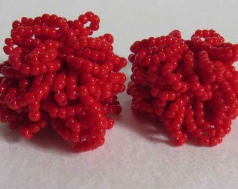 Czech screw back earrings comprised of multitude of vivid red beads