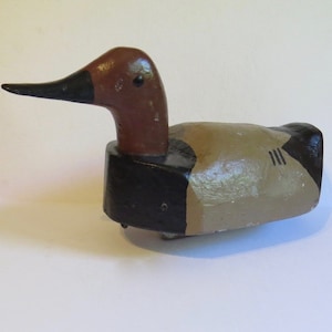 Scarce find style vintage hand carved working wooden duck decoy with rudder.