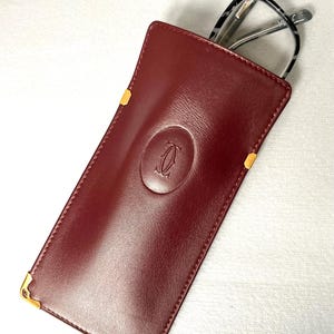 Authentic Cartier glasses case burgundy color luxury leather gold corners