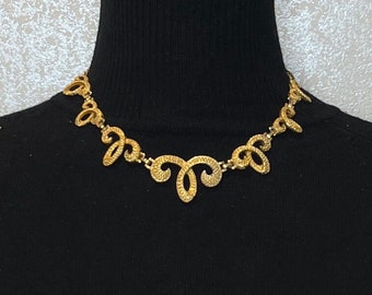 Rare Cathe vintage gold tone necklace choker. Adjustable.