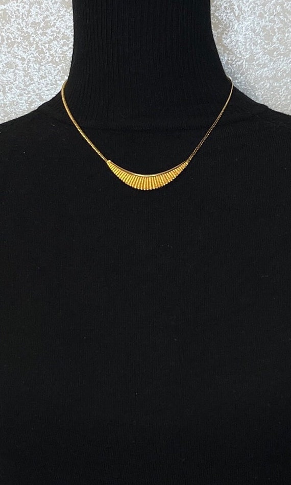 Rare Avon mid century modern necklace. Gold tone o