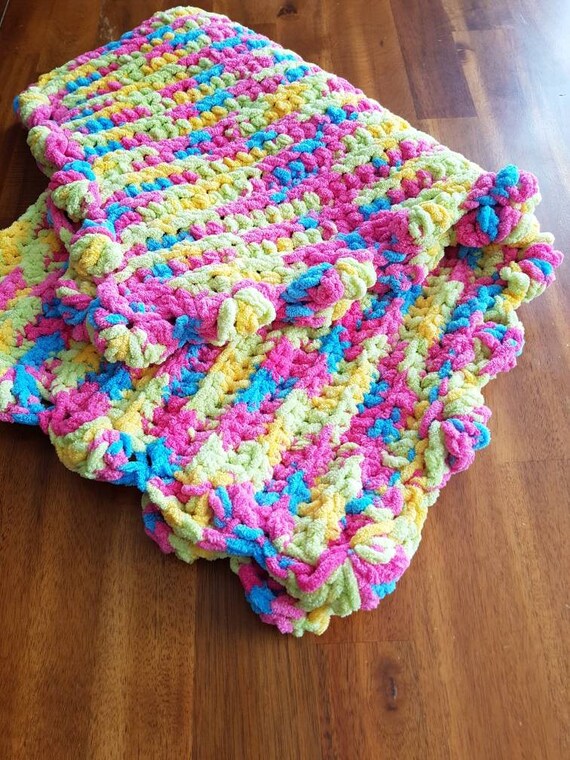 pink and green crochet blanket