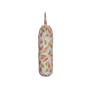 May include: A white fabric bag with a drawstring closure and a loop at the top. The bag is decorated with a repeating pattern of orange and green floral designs. The bag is designed to hold items.