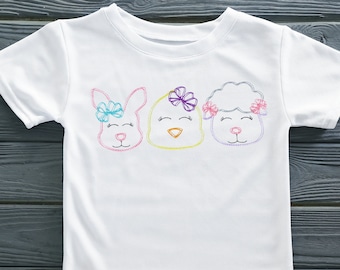 May include: White t-shirt with embroidered images of a bunny, chick, and lamb. Each animal has a bow on its head.