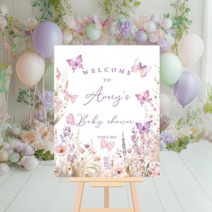 May include: Welcome to Avery's Baby Shower sign with a floral design featuring butterflies and the date June 6, 2025.