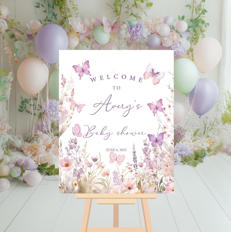 May include: Welcome to Avery's Baby Shower sign with a floral design featuring butterflies and the date June 6, 2025.