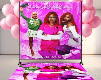 May include: A pink graduation backdrop with the word "Congratulations" in white script. The backdrop features images of three women, a graduation cap, and the text "Class of 2025". Pink balloons and a matching rug complete the scene.