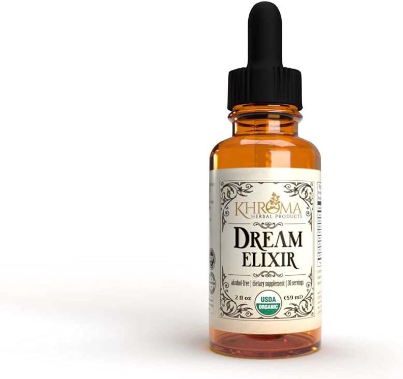 May include: A brown glass bottle with a dropper top and a white label that reads "KHROMA HERBAL PRODUCTS DREAM ELIXIR alcohol-free | dietary supplement | 30 servings 2 fl oz USDA ORGANIC (59 ml)"