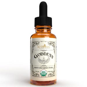 Puede incluir: Una botella de vidrio marrón con un gotero negro. La etiqueta es blanca con letras doradas y un diseño ornamentado. La etiqueta dice "KHROMA Herbal Products" y "GODDESS". La botella contiene 59 ml de líquido orgánico certificado por el USDA.