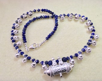 Handmade Lapis Lazuli & Sterling Silver necklace, adorned with a Sterling Silver Kavach pendant, that opens to seal in anything you desirer