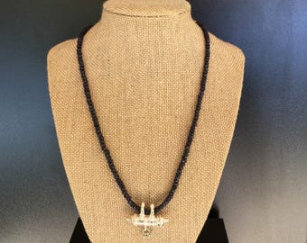 Natural faceted sapphire gemstone necklace with a sterling silver Kavach/pendant, with copper pyrite beads. Healing energy jewelry.