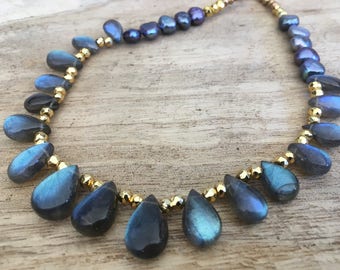 Unbelievable natural AAA labradorite with blue shimmer, Baroque style pearls set in gold pyrite on an adjustable cord necklace with a tassel