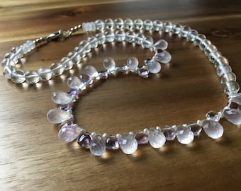 Stunning Rose Quartz, Amethyst, Natural Quartz and Moonstone gemstone necklace set in Sterling Silver and fresh water pearls. Healing Energy