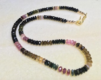 Beautiful A grade black and multitourmaline gemstone facted rondelle necklace with Bail gold vermeil spacer beads and clasp. Healing Jewelry