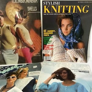May include: A collection of vintage knitting and fashion magazines. Titles include "Stylish Knitting," "Columbia Minerva Shells," "Breeze Knits," and "Soft Shapes." The magazines feature images of women in knitted garments and swimwear.