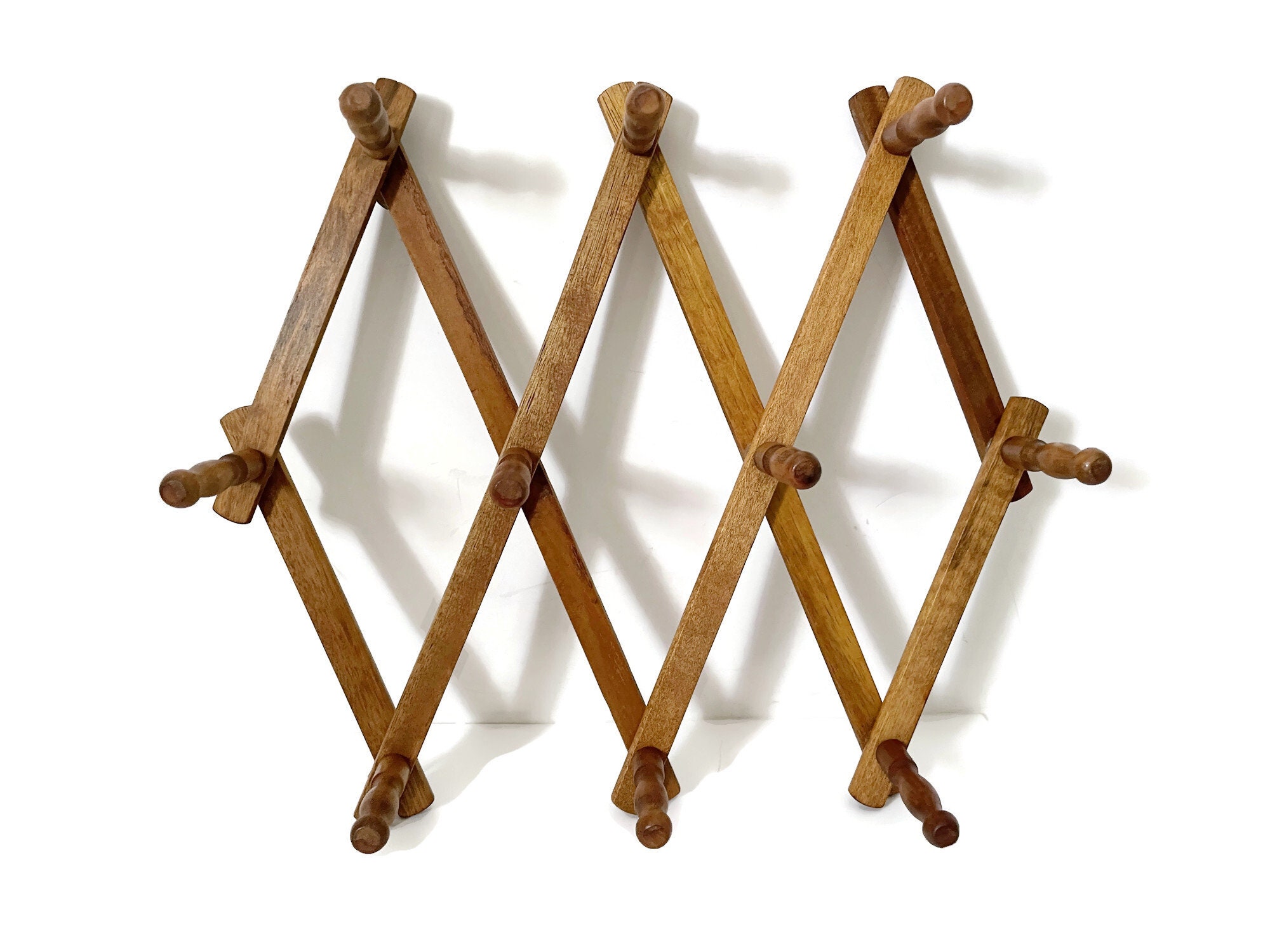 Expandable wooden peg rack hotsell